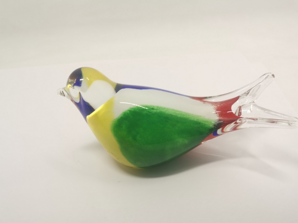 Glass bird on metel stick